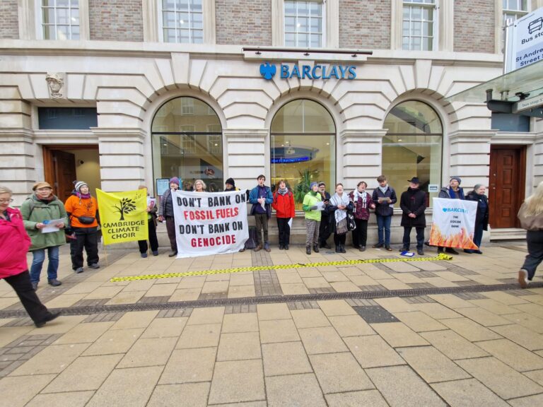 Cambridge Climate Choir singing outside Barclays, HSBC and NatWest
