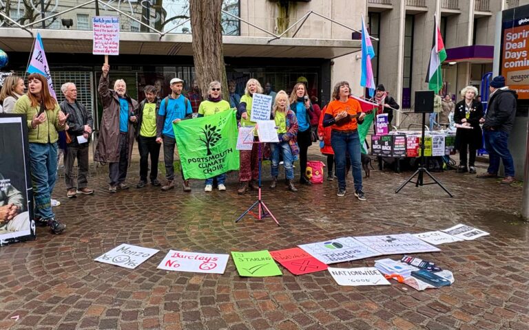 Portsmouth Climate Choir sings outside Barclays